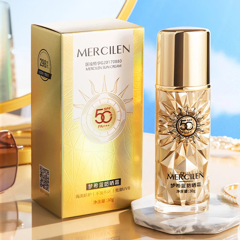 Gold skincare product and packaging withMercilen branding on a reflective surface.