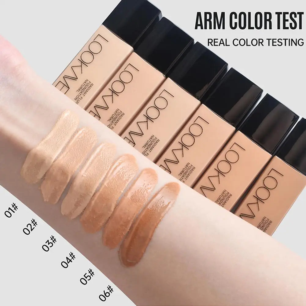 Foundation swatches on an arm with 'LOOKA' branding, labeled for color testing.