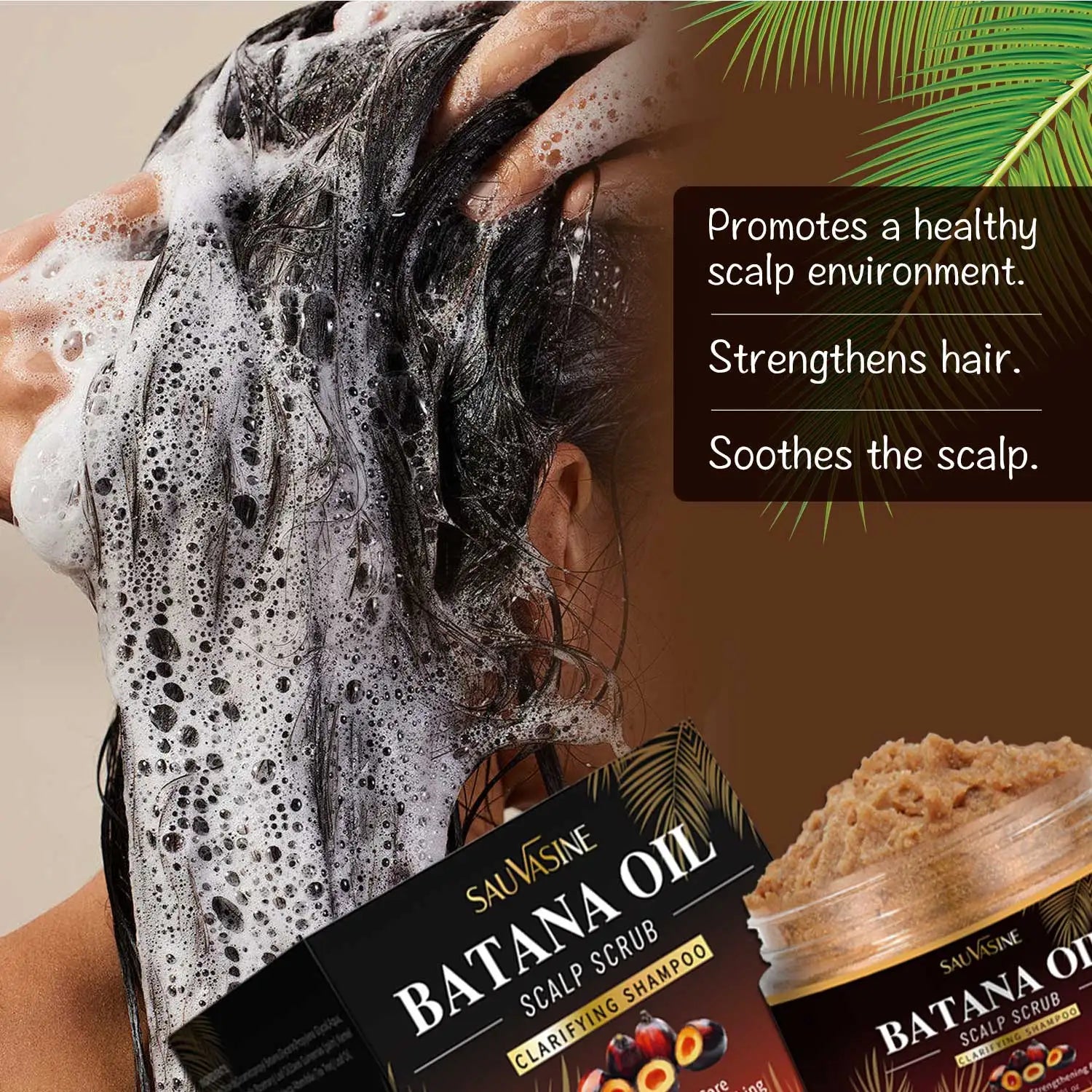 Person washing hair with a box of Sauásine Batana Oil Scalp Scrub in the foreground.