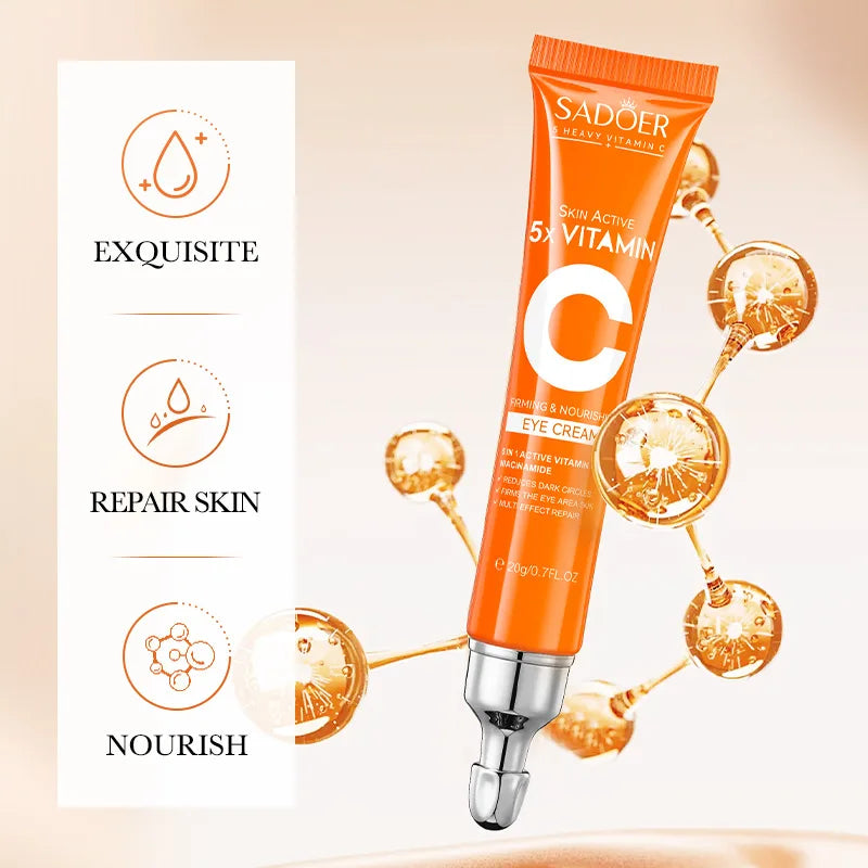 Orange eye cream tube with packaging on a beige background