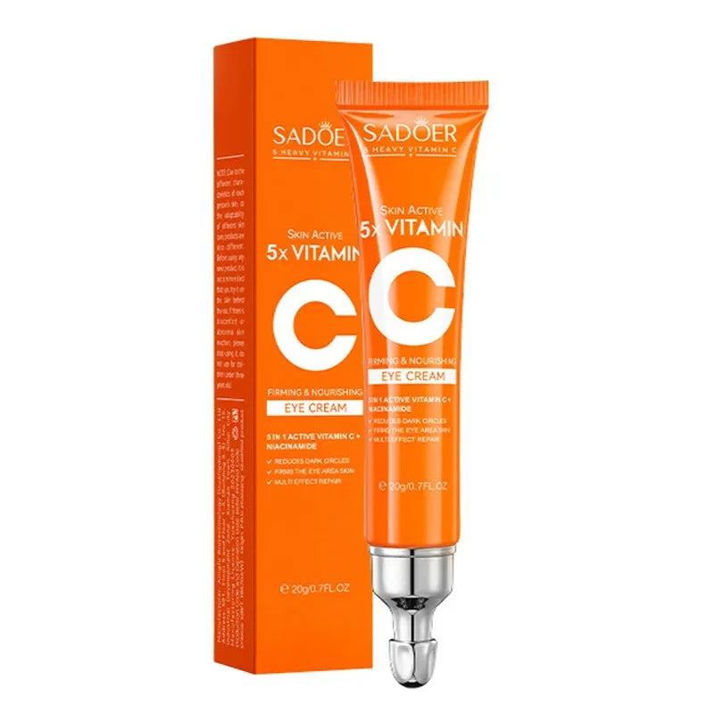 Orange eye cream tube and packaging with 'Sadoér' branding on a white background