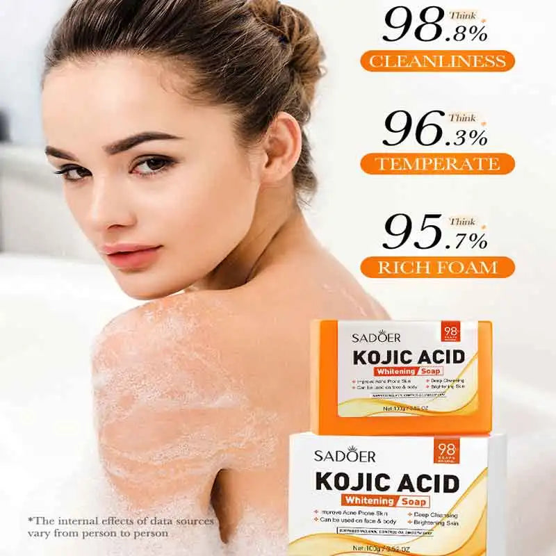 Woman with soap suds on her shoulders next to Sadeer Kojic Acid Whitening Soap packaging.