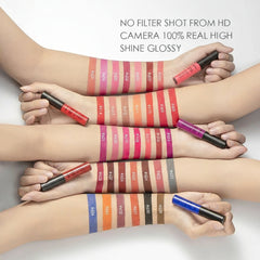 Multiple hands holding lip gloss applicators with color swatches on a white background, featuring the brand 'QIBEST'.