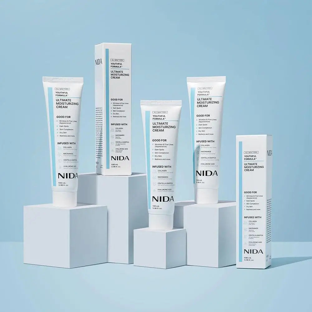 NIDA skincare products on a light blue background