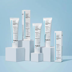NIDA skincare products on a light blue background