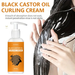 Black Castor Oil Curling Cream bottle with person applying cream to hair on a white background