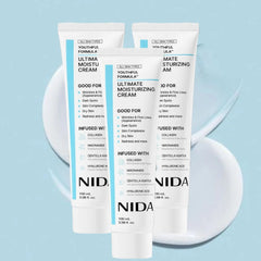 Two NIDA skincare cream tubes on a light blue background